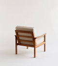Arne Wahl Iversen teak lounge chair, angled view showing frame and upholstery